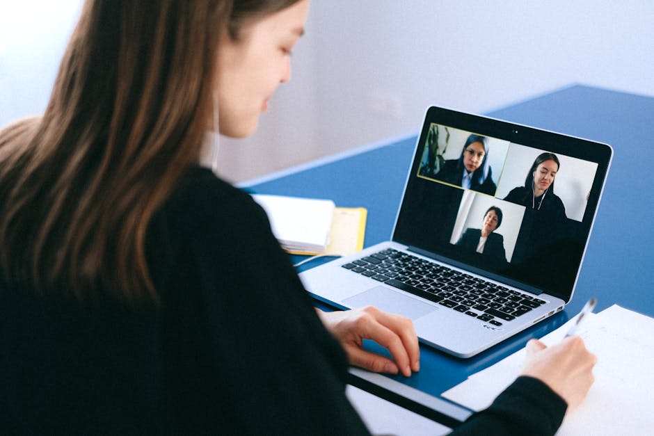 A video conference with several named participants on screen