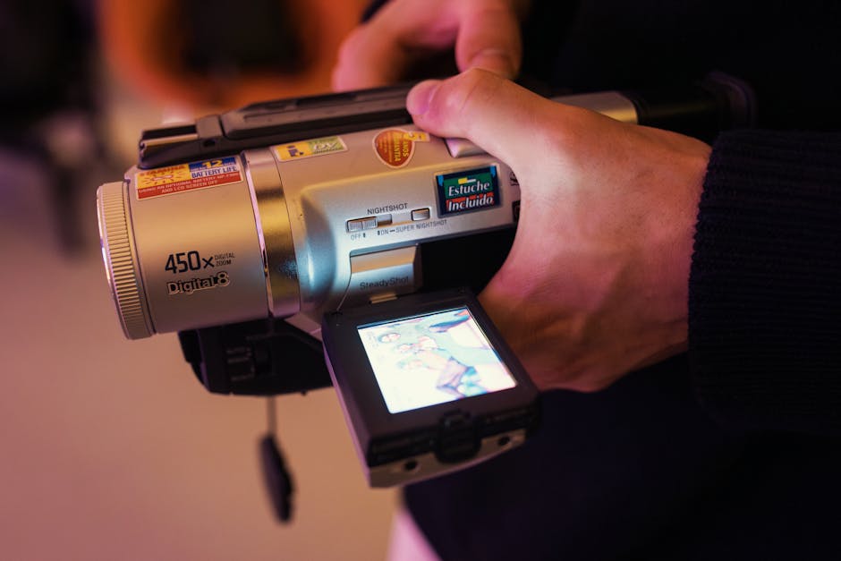 A video recording with a play button on screen